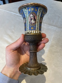 A gilt copper and enamelled water pipe base on wooden stand, Qajar, Iran, 19th C.
