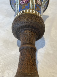 A gilt copper and enamelled water pipe base on wooden stand, Qajar, Iran, 19th C.