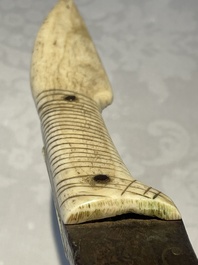 A varied collection of two daggers, two swords and forearm protection, India and Turkey, 19th C.