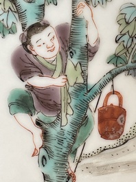 A Chinese famille verte dish with a sage and two boys under a tree, Shizhu 石竹 seal mark, Yongzheng