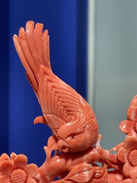 A Chinese red coral group of birds among flowering branches, 19/20th C.