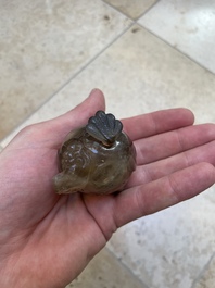 Two Chinese agate snuff bottles in the form of a bird and a pekinese, 19th C.