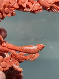 A Chinese red coral group of birds among flowering branches, 19/20th C.