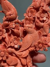 A Chinese red coral group of birds among flowering branches, 19/20th C.
