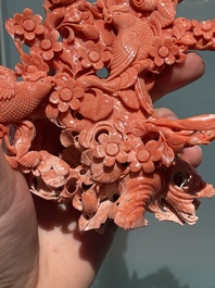 A Chinese red coral group of birds among flowering branches, 19/20th C.