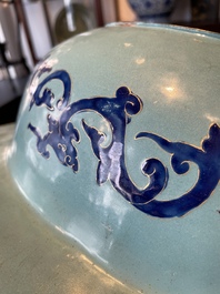 A large Chinese Canton enamel basin with figures in a landscape, Jiaqing