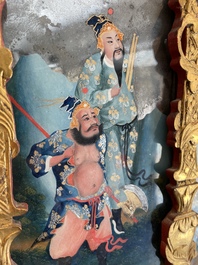 A rare Chinese gilt wood and reverse glass painted mirror, 2nd half 18th C.
