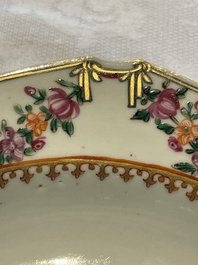 A pair of Chinese famille rose octagonal armorial plates, Qianlong