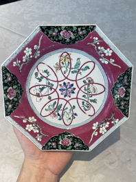 Four octagonal Chinese famille rose ruby-ground plates with floral design, Yongzheng