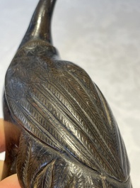 A Chinese bronze candle or incense holder in the shape of a crane standing on a turtle and a Tibetan vajra, Ming/Qing