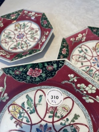 Four octagonal Chinese famille rose ruby-ground plates with floral design, Yongzheng