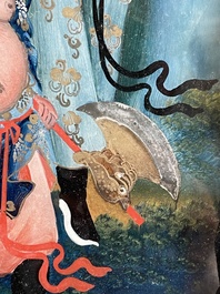 A rare Chinese gilt wood and reverse glass painted mirror, 2nd half 18th C.