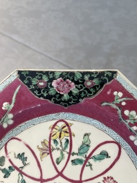Four octagonal Chinese famille rose ruby-ground plates with floral design, Yongzheng