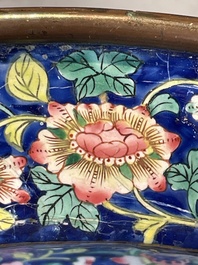 A large Chinese Canton enamel basin with figures in a landscape, Jiaqing