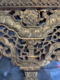 A rare Chinese gilt wood and reverse glass painted mirror, 2nd half 18th C.