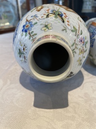 A pair of Chinese Canton famille rose vases and a pair of Dehua blanc de Chine drum-shaped covered jars, 19th C.