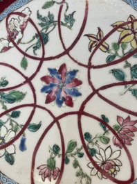 Four octagonal Chinese famille rose ruby-ground plates with floral design, Yongzheng
