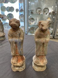 An impressive set of 12 Chinese cold painted terracotta zodiac figures, Ming
