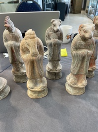 An impressive set of 12 Chinese cold painted terracotta zodiac figures, Ming