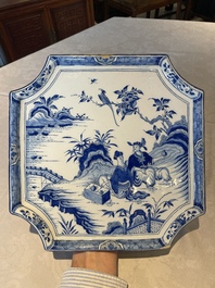 A blue and white Dutch Delft chinoiserie plaque with a tea drinking scene, 18th C.
