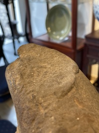 A sandstone torso and a Buddha head, Cambodia, late Khmer period, 13/14th C.