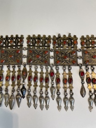 Three silver head ornaments and a chest ornament, Turkmenistan, 19/20th C.