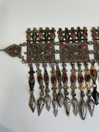 Three silver head ornaments and a chest ornament, Turkmenistan, 19/20th C.