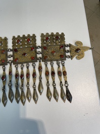 Three silver head ornaments and a chest ornament, Turkmenistan, 19/20th C.