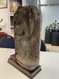 An Indonesian lavastone stele depicting goddess Durga, Central Java, 10/11th C.