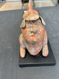A Chinese Mingqi terracotta amphibian-shaped grave guardian with human head, Western Han