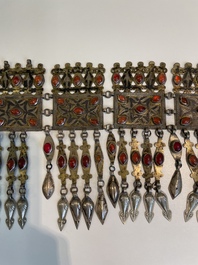Three silver head ornaments and a chest ornament, Turkmenistan, 19/20th C.