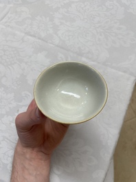 A Chinese ge-type brush washer, a pair of pink bowls, two plates and a saucer, Kangxi and later