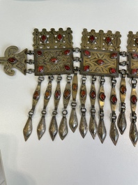 Three silver head ornaments and a chest ornament, Turkmenistan, 19/20th C.