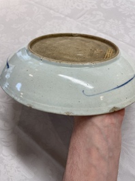 A Chinese ge-type brush washer, a pair of pink bowls, two plates and a saucer, Kangxi and later