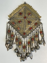 Three silver head ornaments and a chest ornament, Turkmenistan, 19/20th C.