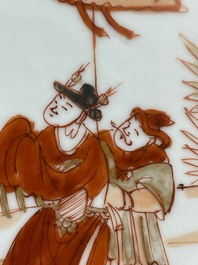 A pair of Chinese iron-red saucers and two plates, Kangxi/Yongzheng