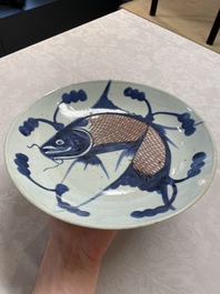 A Chinese ge-type brush washer, a pair of pink bowls, two plates and a saucer, Kangxi and later
