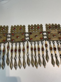 Three silver head ornaments and a chest ornament, Turkmenistan, 19/20th C.