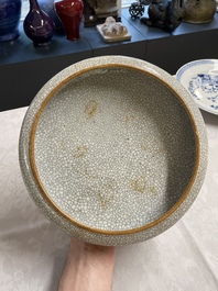 A Chinese ge-type brush washer, a pair of pink bowls, two plates and a saucer, Kangxi and later