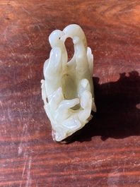 A fine Chinese white jade Buddha's hand on wooden stand, Qing