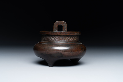 A Chinese bronze two-handled tripod censer, Ding 鼎 mark, Yuan/Ming