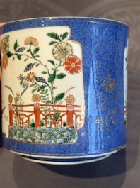 A pair of Chinese powder blue-ground famille verte vessels with a bird in a garden, Kangxi