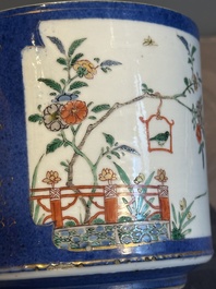 A pair of Chinese powder blue-ground famille verte vessels with a bird in a garden, Kangxi