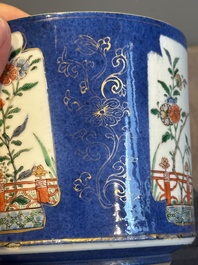 A pair of Chinese powder blue-ground famille verte vessels with a bird in a garden, Kangxi