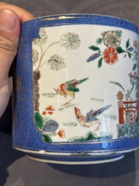 A pair of Chinese powder blue-ground famille verte vessels with a bird in a garden, Kangxi