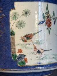 A pair of Chinese powder blue-ground famille verte vessels with a bird in a garden, Kangxi