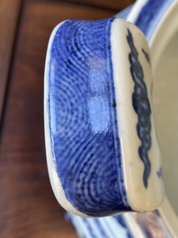 A large Chinese blue and white 'bajixiang' and 'lotus scrolls' tripod censer, Qianlong