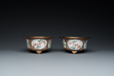 A pair of Chinese Canton enamel quatrefoil jardini&egrave;res with figural design, Qianlong mark, 19th C.