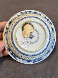 A Chinese blue and white reticulated double-walled cup and saucer, lingzhi mark, Kangxi