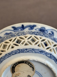 A Chinese blue and white reticulated double-walled cup and saucer, lingzhi mark, Kangxi